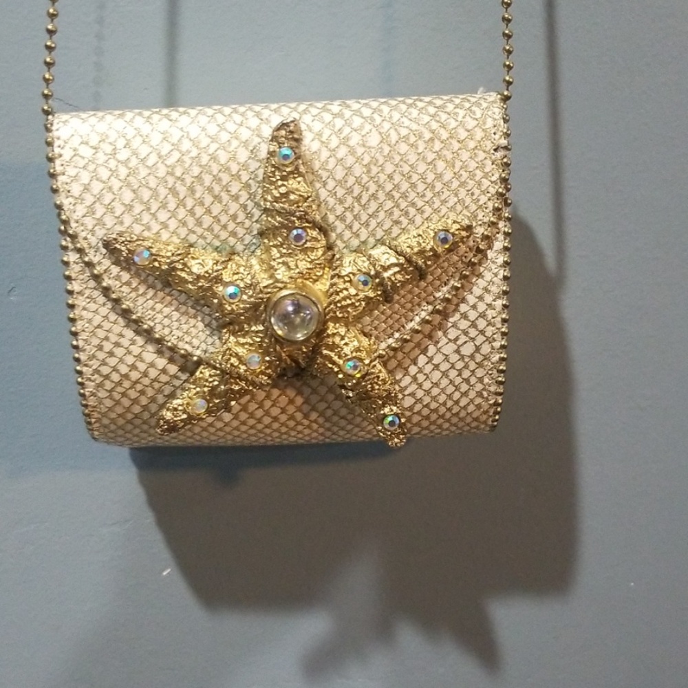Nina Arjani starfish evening bag